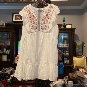 white linen look dress with flowery embroidery